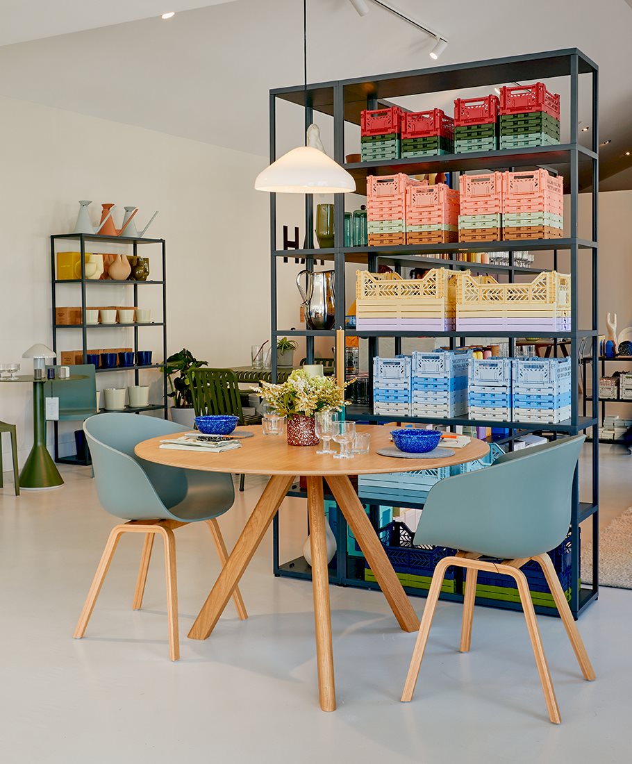 Inside the HAY Melbourne store with CPH 25 Table, AAC 22 Chairs and Pao Pendant Lamp.