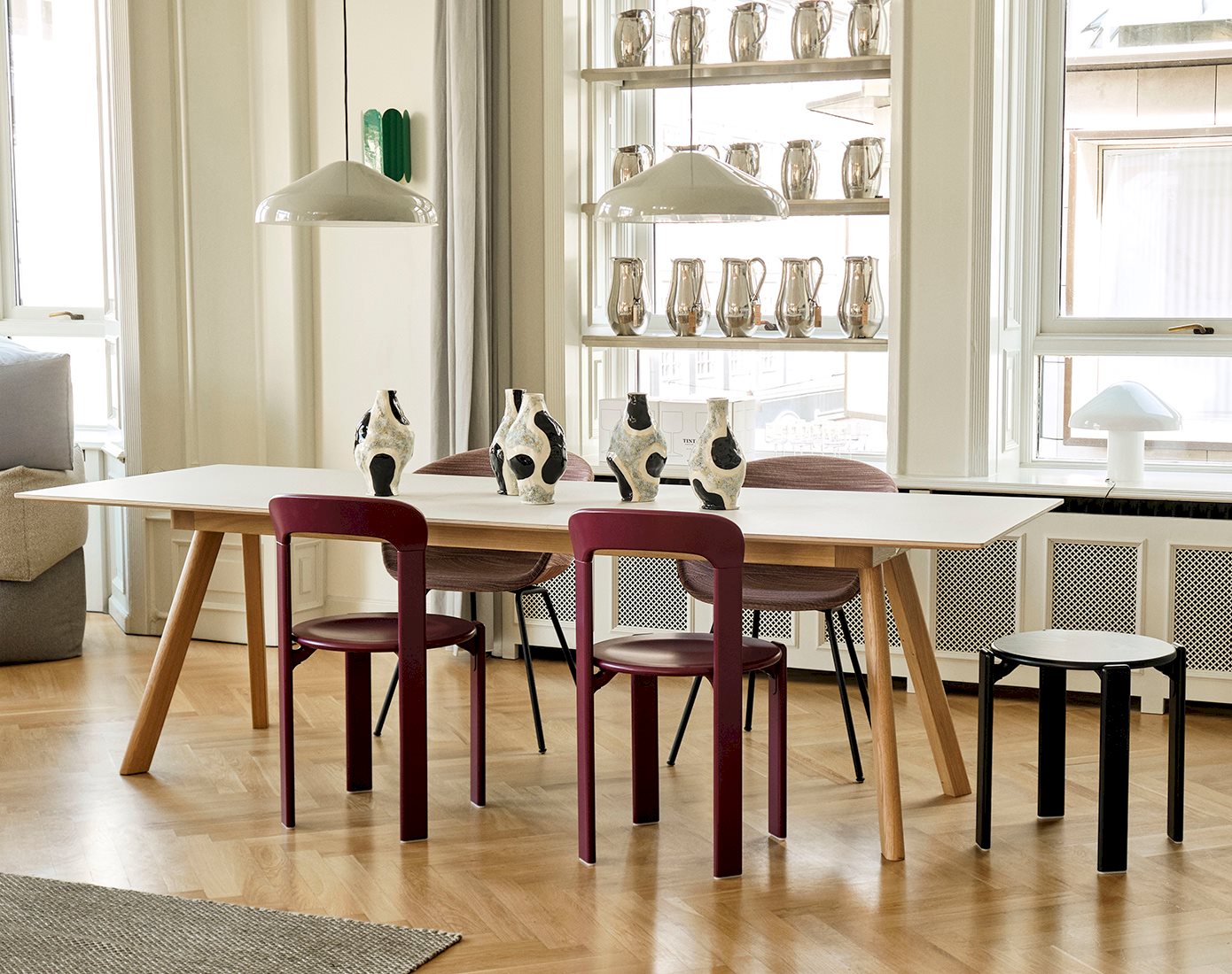 Inside HAY House Copenhagen store with CPH 30 Table, Rey Chair, Rey Stool and Pao Steel Pendant.